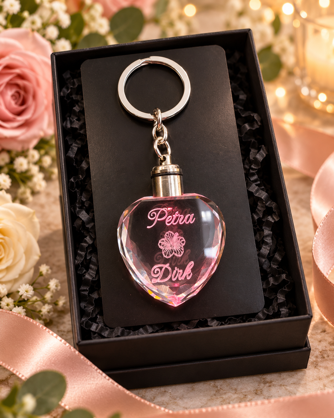 Heart-shaped crystal keyring with personalised names and decorative marking in a gift box
