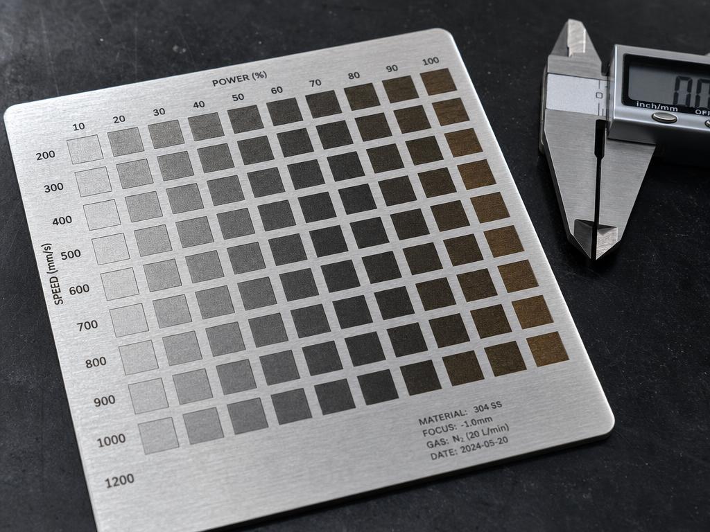 Materials test coupons — Power / speed grids marked on client-supplied stock